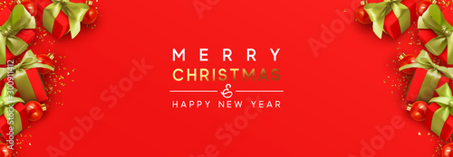 Holiday banner Merry Christmas and Happy New Year. Xmas design with festive objects, realistic red gift box, bauble balls, glitter gold confetti. Horizontal poster, web header, greeting card