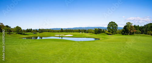Golf Course with beautiful green field. Golf course with a rich green turf beautiful scenery.