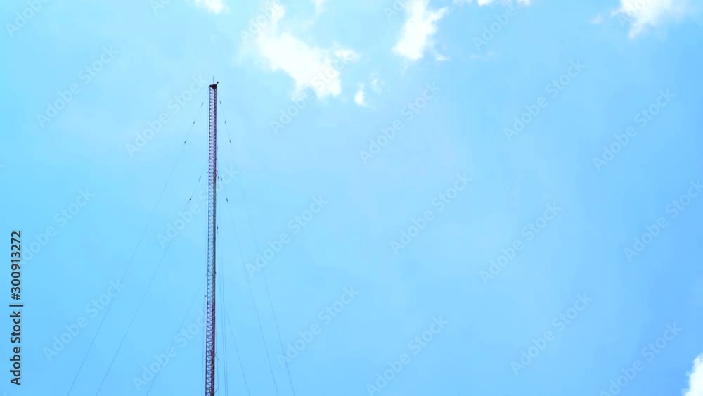 4K video, clear sky background with clouds and radio towers in Phuket, Thailand. 4K video, clear sky background with clouds and radio towers in Phuket, Thailand.