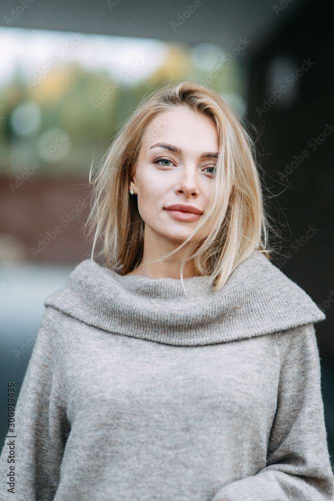 Woman in jacket emotional portrait. Beautiful smiling girl in town. Woman in jacket emotional portrait. Beautiful smiling girl in town.