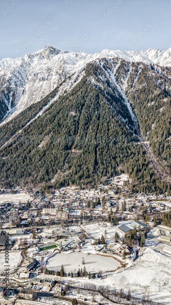 Aerial drone view of Chamonix city at the foot of snow covered Alps  mountain brevent foto de Stock | Adobe Stock