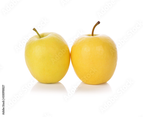 Ripe yellow apple isolated on white