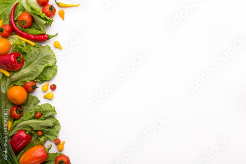 Fresh and healthy frame of different Vegetables on white