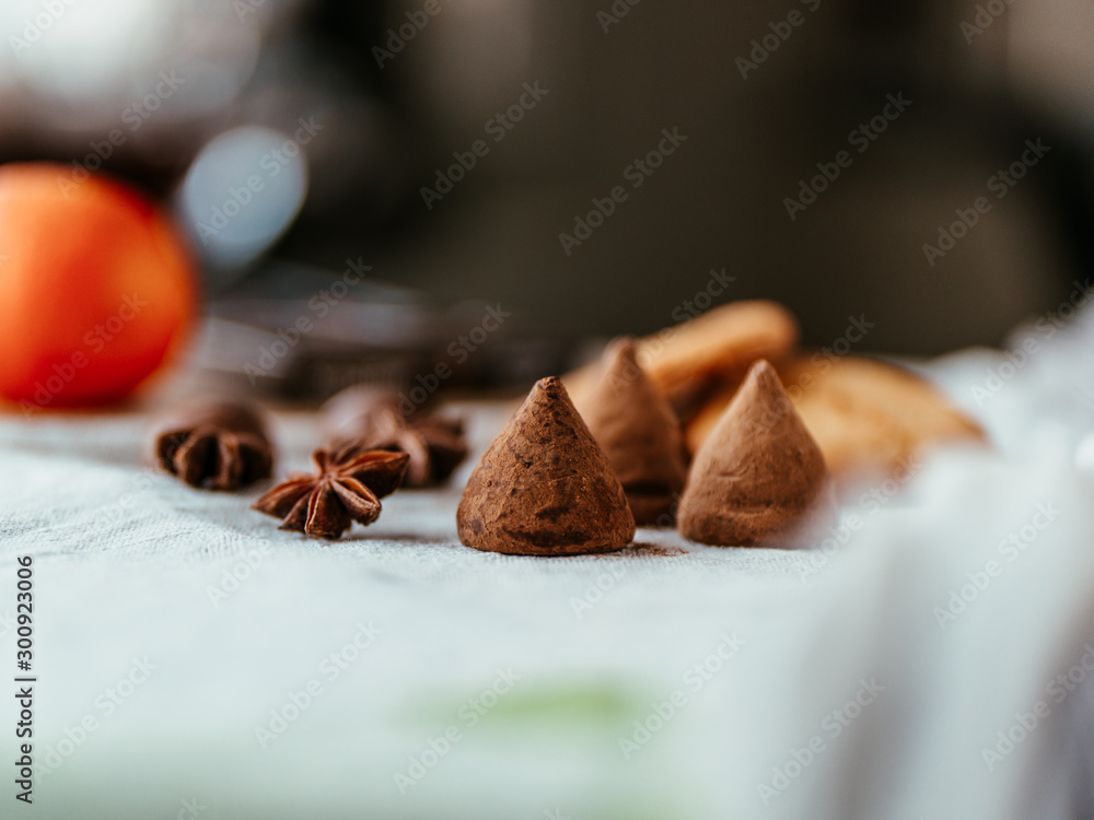 Truffels and cookies on linen background