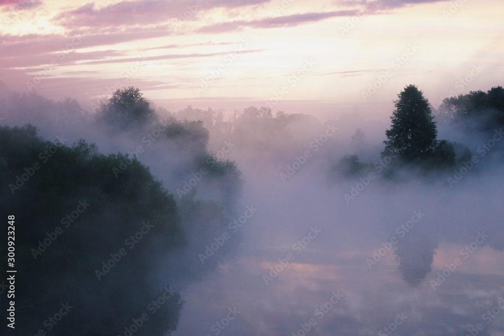 Fog over river at sunrise Fog over river at sunrise