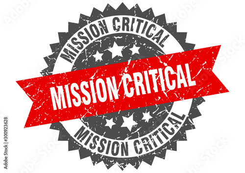 mission critical grunge stamp with red band. mission critical