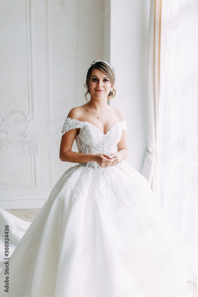 European-style wedding at the hotel. Bride in a white dress in the interior Studio. European-style wedding at the hotel. Bride in a white dress in the interior Studio.