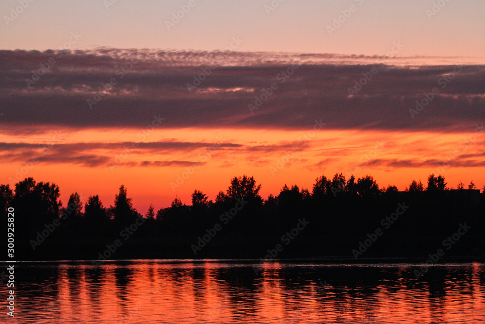 Beautiful orange sunset view of lovely water reflection and sea Lielupe flowing through. Beautiful orange sunset view of lovely water reflection and sea Lielupe flowing through.