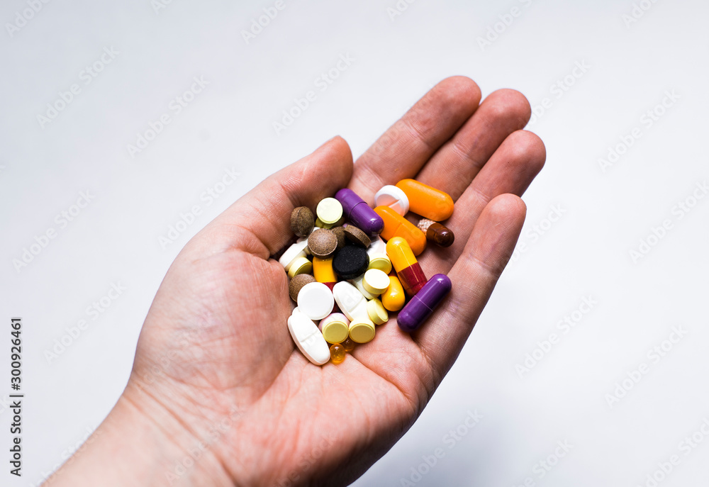 Medical pills in human hand Medical pills in human hand
