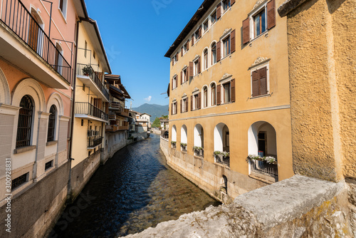 Fototapeta Naklejka Na Ścianę i Meble -  The River Brenta in downtown of Borgo Valsugana, small village in Sugana valley, Trentino Alto Adige, Italy, Europe