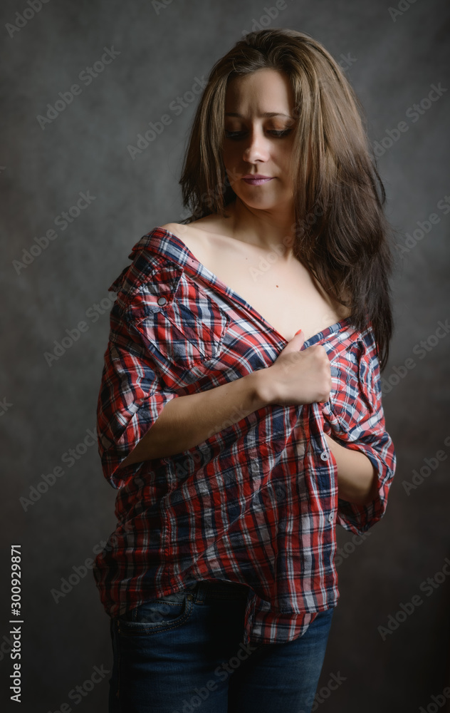 Portrait of beautiful sensual woman with blue eyes. Studio shot. Portrait of beautiful sensual woman with blue eyes. Studio shot.