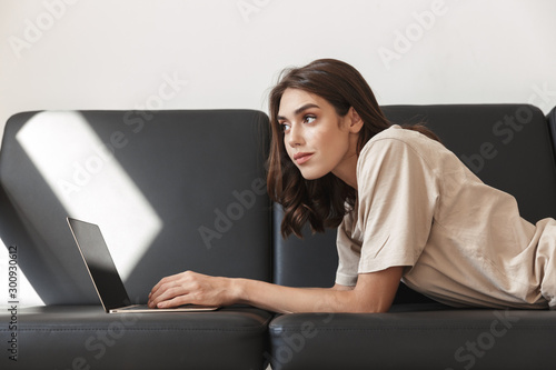 Amazing woman using laptop computer.