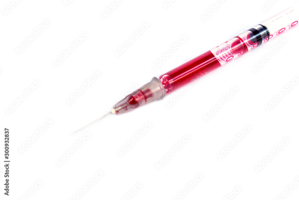 Fototapeta premium Plastic syringe on white background