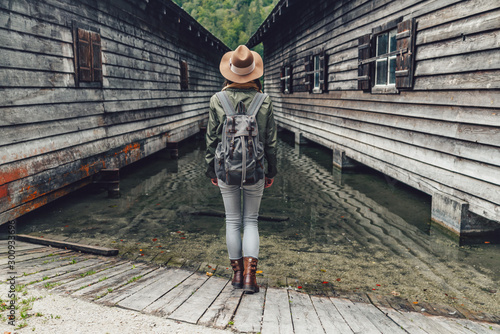 Young woman with a backpack in Obersee