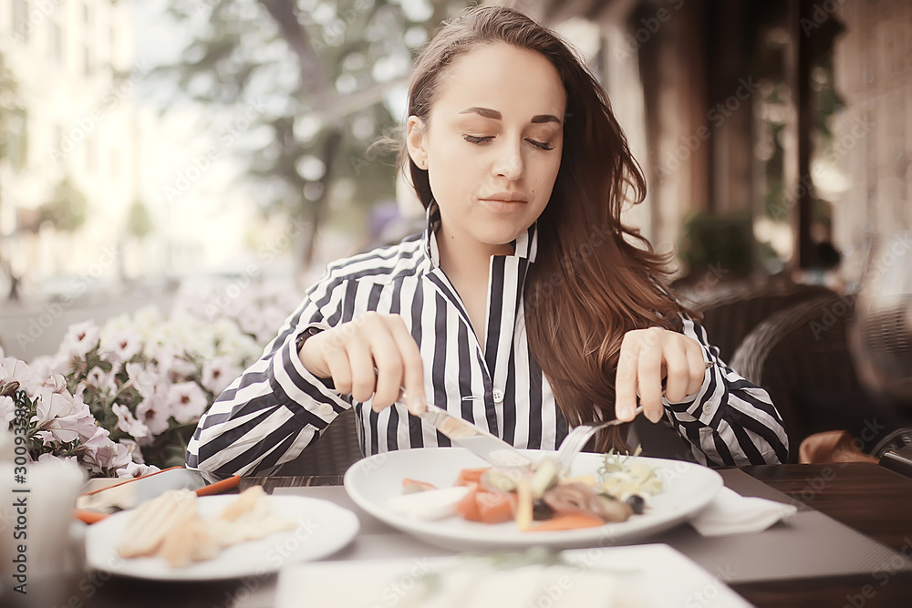girl lunch cafe table portrait, beautiful brunette in the restaurant interior eats girl lunch cafe table portrait, beautiful brunette in the restaurant interior eats