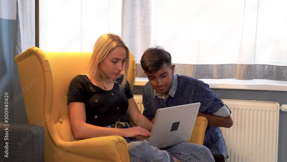 Boyfriend checking young entrepreneur woman work on the laptop. Boyfriend checking young entrepreneur woman work on the laptop.