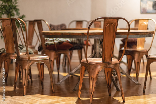 Stylish Vintage Copper color chairs with wooden table