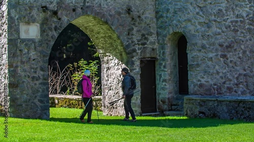 Hikers Going Through the Main Gate of Masun Castle,Ilirska Bistrica. photo