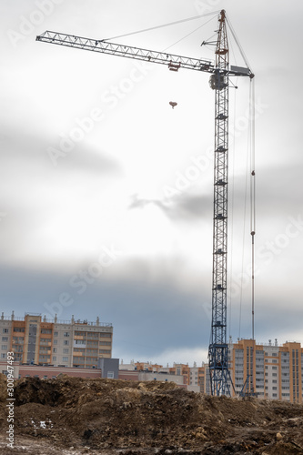 Canvastavla construction cranes on the construction site new residential area
