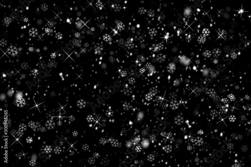 falling snowflakes on black background