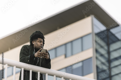 attractive african black man listening to music