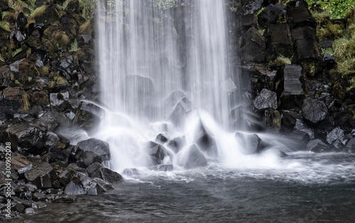 Svartifoss Waterfall in Iceland near Vatnajokull glacier, famous for its wide basalt stone wall