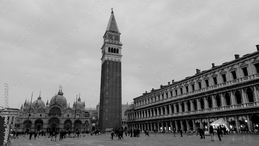 Black and white photo of bell tower of St Mark's Campanile taken in the beautiful city of Venice, Italy