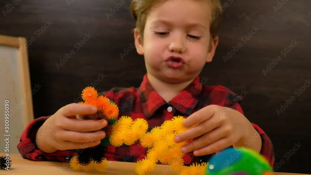Preschool caucasian child play with toy, kid lesson, education. Preschool caucasian child play with toy, kid lesson, education.
