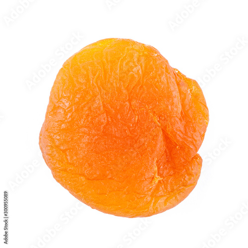 Dried apricot ingredient closeup isolated on a white background. One orange apricot fruit with clipping path