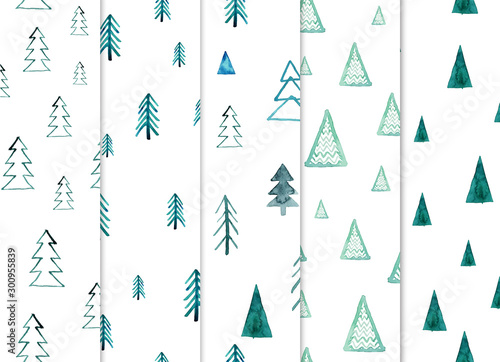 Seamless set of watercolor forest patterns. Green trees on white background. Abstract watercolor illustration. Can be used for pattern fills, wallpapers,texture of fabric, surface textures.