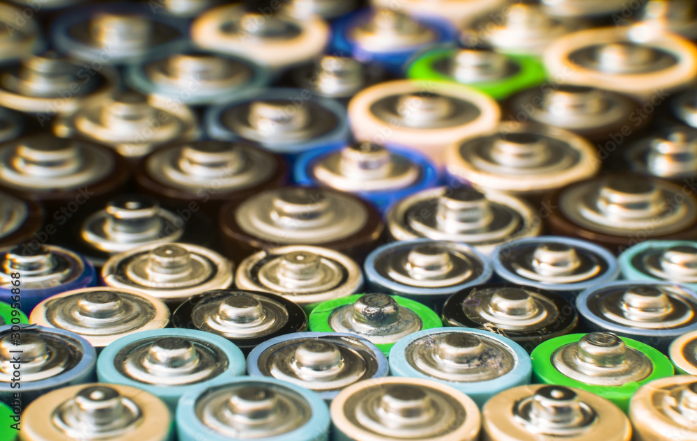Group of used disposable drain batteries of various size Group of used disposable drain batteries of various size
