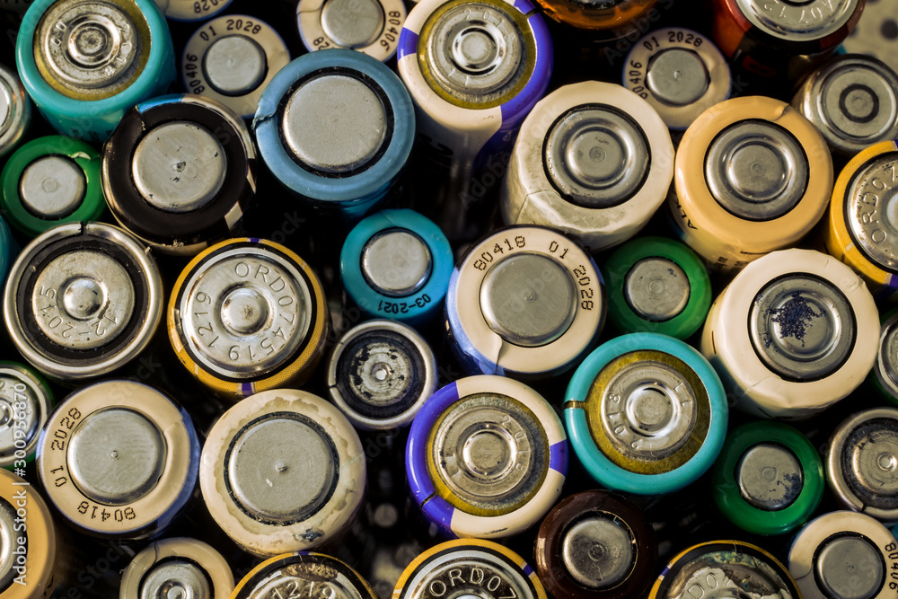Group of used disposable drain batteries of various size Group of used disposable drain batteries of various size
