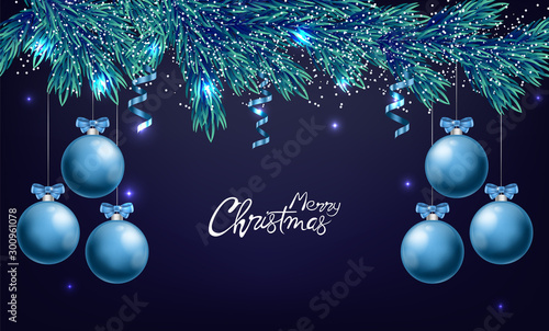 Merry christmas panoramic composition with blue ornamented baubles with ribbo...
