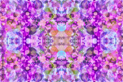 Purple kaleidoscope multicolored abstract background. © zurbagan