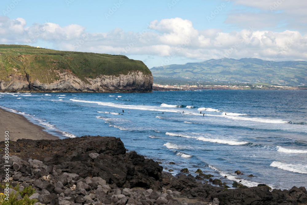Fototapeta premium The beautiful Praia do Areal de Santa Barbara beach on the island of San Miguel, Portugal. Ideal place for surfing and bodyboarding.