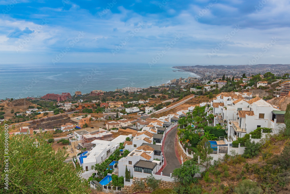 A view of the surroundings and the sea from Benalmadena Butterfly Park. Malaga, Andalusia, Spain.