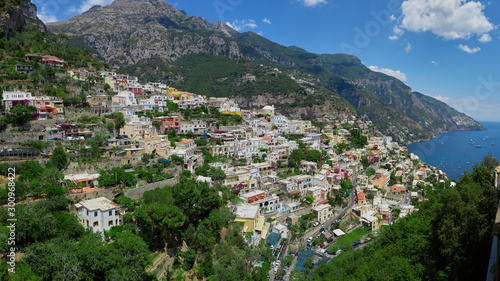 One of the best resorts of Italy with old colorful villas on the steep slope, nice beach, numerous yachts and boats in harbor and medieval towers along the coast, Positano. © sarymsakov.com