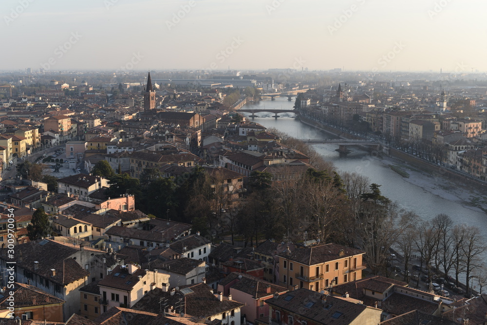View of Verona with river and bridges at the end of winter