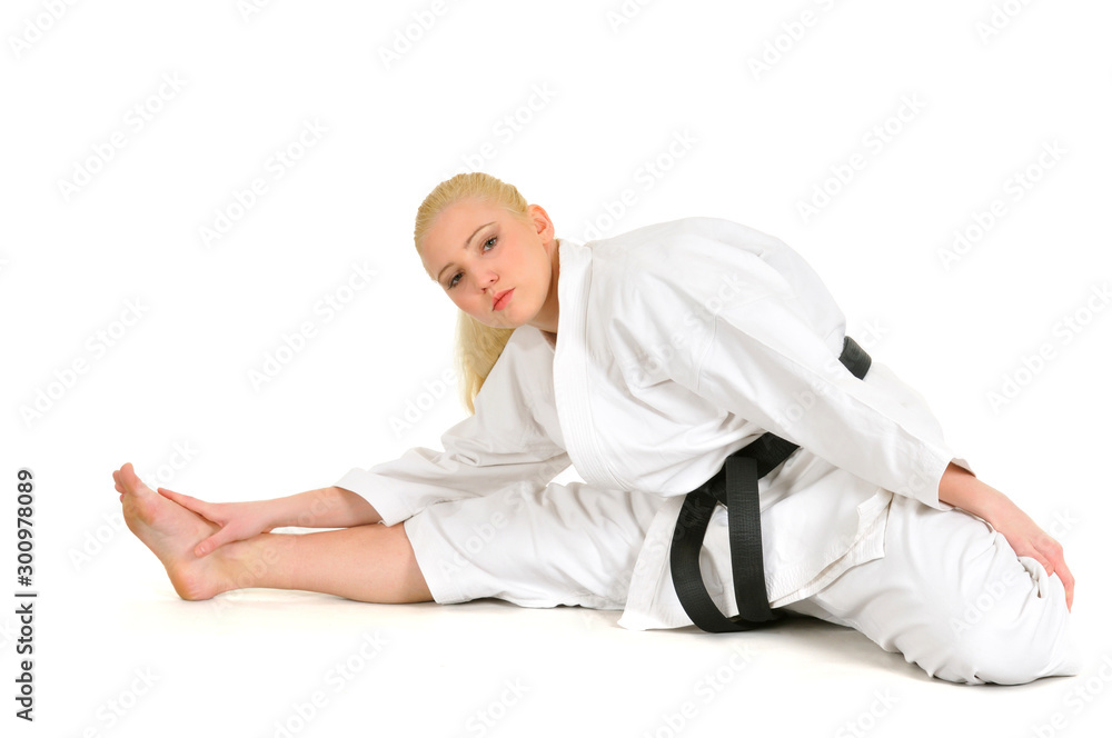 Girl blonde karate sportswoman in a kimono Girl blonde karate sportswoman in a kimono