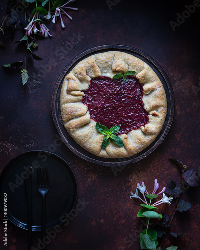 Homemade open cake made of red currant shortcrust pastry, gallette