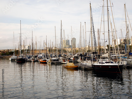 Yacht Parking in the port of Barcelona, in the background of the port management building. © wpg77