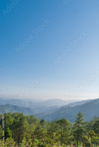 green forest blue ridge mountains smoky mountain landscape background layered hills and valleys 