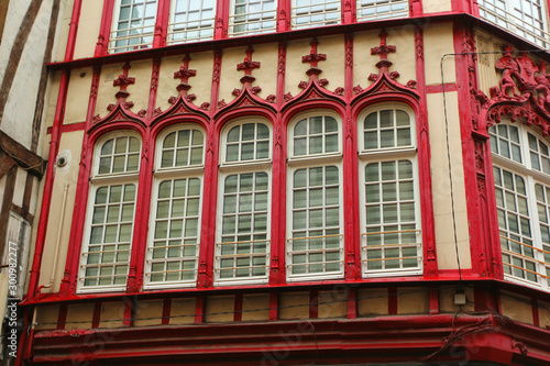 Amazing old red carved window frames of Normandy, France, Rouen