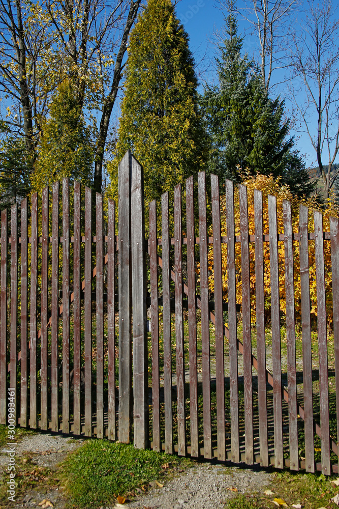 old wooden gate in autumn scenery old wooden gate in autumn scenery