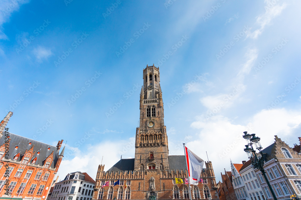 Fototapeta premium Grote Markt square or Market Square in Brugge and Belfort tower, Belgium