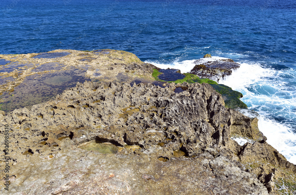 Strange rock formations on the coast called Devil's Tear of Nusa Lembongan, Bali, Indonesia