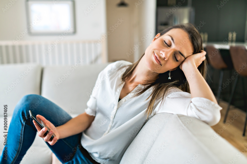 Brunette having good time on the living room Brunette having good time on the living room