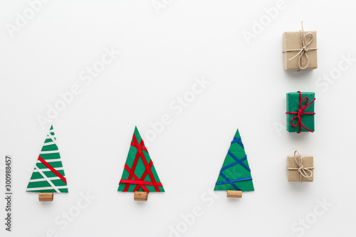 Christmas composition. Gift christmas tree top top view background with copy space for your text. Flat lay.