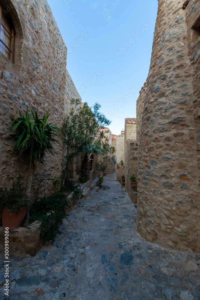 Romantic fortified greek village on rock island Monemvasia at sunset Romantic fortified greek village on rock island Monemvasia at sunset