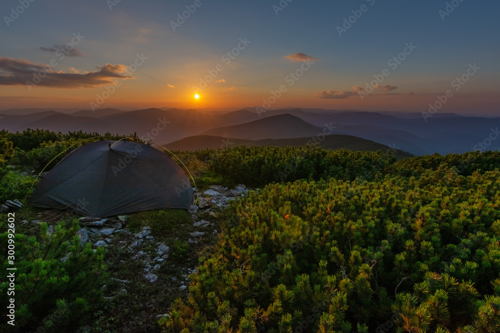 Beautiful summer in the Carpathian Mountains with tourists in tents with beautiful views ..